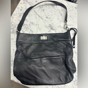 Black purse with silver embellishments.